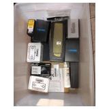 Bin of empty guitar pedal boxes: Boss, Laney,
