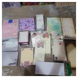 Assorted notepads and notebooks most new in