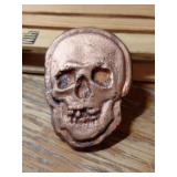 3.3 OUNCES OF HAND POURED. COPPER SKULL COOL