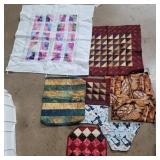 Hand made quilted wall hangings, pot holders,