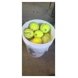 Bucket of softballs