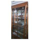 Large lighted curio display cabinet with glass