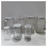 7 glass jars with metal lids