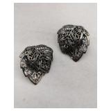 Silver leaf clip-on earrings marked Sterling