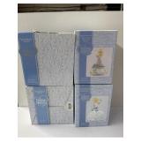4 Precious moments figurines in original box