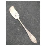 Silver butter knife marked Sterling .850oz