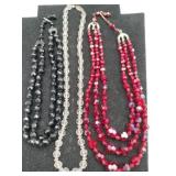 Black clear and red strand beaded necklace