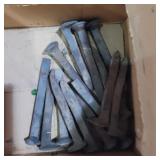 Assorted railroad spikes