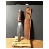 A VERY OLD ORIGINAL BOWIE KNIFEWITH LEATHER