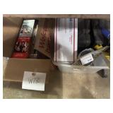 Variety of tools and box full of VHS tapes