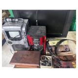 Flatscreen TV, karaoke machine, coffee maker,