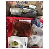Mixed baking supplies, candles, cookie cutters,