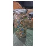 Jar of assorted marbles