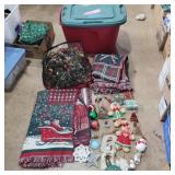 Christmas ornaments, blankets, and wreaths in a
