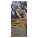 Wooden crate with picture frames some with