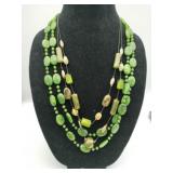 Green carved plastic beaded necklace