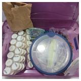 Assorted beads in container with lid
