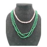 green and pink beaded necklaces