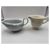 Two porcelain creamers