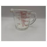 Measuring one cup liquid Pyrex.