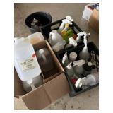 Variety of partially used cleaning products and a