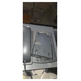 Cisco corded phone with a wall mount