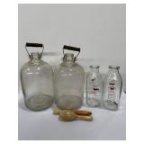 2 1-gallon clear glass jug With wooden