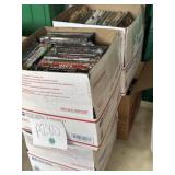 4 boxes of DVDs