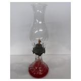 15 Eagle Cranberry Glass Oil Lamp with a red