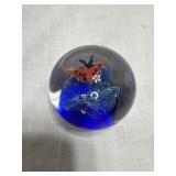 Glass paperweight with butterfly image