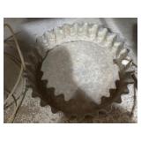 Older galvanized metal feeding pan with hose