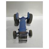 Blue plastic tractor (broken)