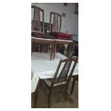 Drop leaf wooden dinning table with 4 matching