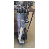 Unmarked golf bag with assortment of clubs