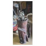 Unmarked golf bag with assorted clubs