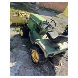 John Deere 318 garden tractor equipped with a