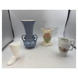Four vases different sizes
