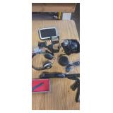Speaker,  headphones, phone chargers, case and