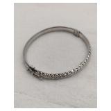 Silver hinged bangle bracelet safety lock marked