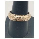 Gold tone silver band ring marked 925 size 9