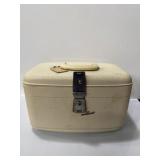 cream-colored hardshell Travel Smart makeup and