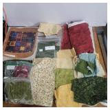 Unfinished quilt with pattern and some fabric