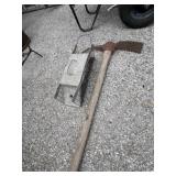 Old Pickax and small animal live trap