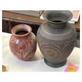 Etched metal and stoneware urn vases
