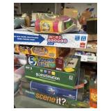 Various board games and unopened toy bubble gun