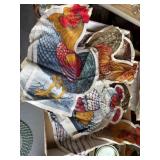 A variety of quilting pieces, books, chicken