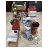 Old books, drawer dividers, vanity mirrors, and