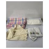 Assortment of table top cloths, blankets