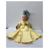 24 inch yellow dressed doll with blue hair