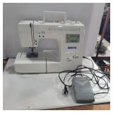 White Model 2999 Electric Sewing Machine with its